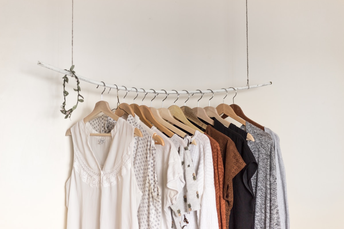 A considered rail of neutral seasonal clothing